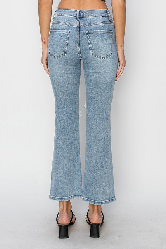 RISEN: KNEE DISTRESSED ANKLE FLARE JEANS