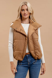 ASYMMETRICAL PUFFER VEST | BROWN