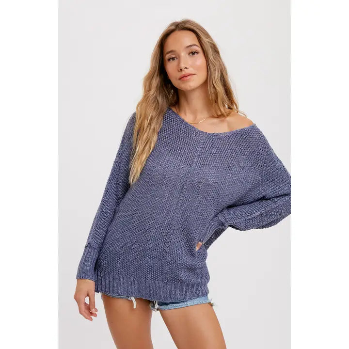 BLUE EXPOSED SEAM SWEATER